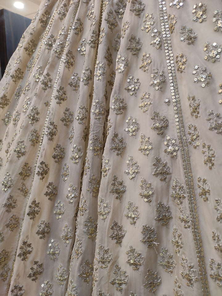 DAZZLING CREAM  LEHENGA CHOLI shreedesignersaree