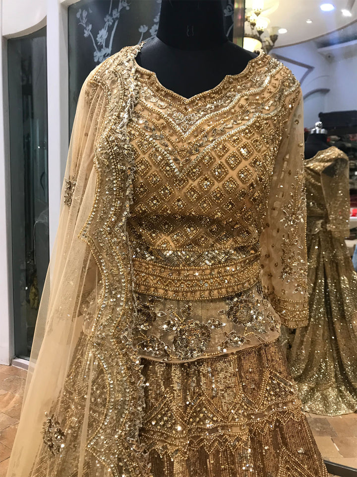 DAZZLING GOLD LEHENGA CHOLI shreedesignersaree